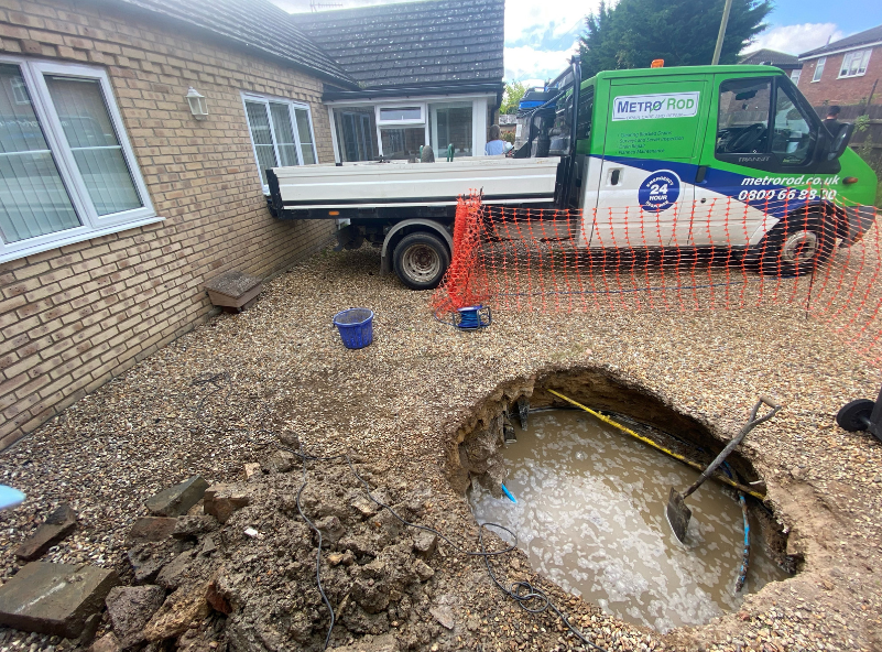 Sink hole turned rain water tank collapse Cambridgeshire